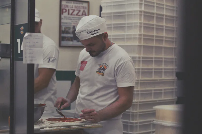 Chef preparing pizza